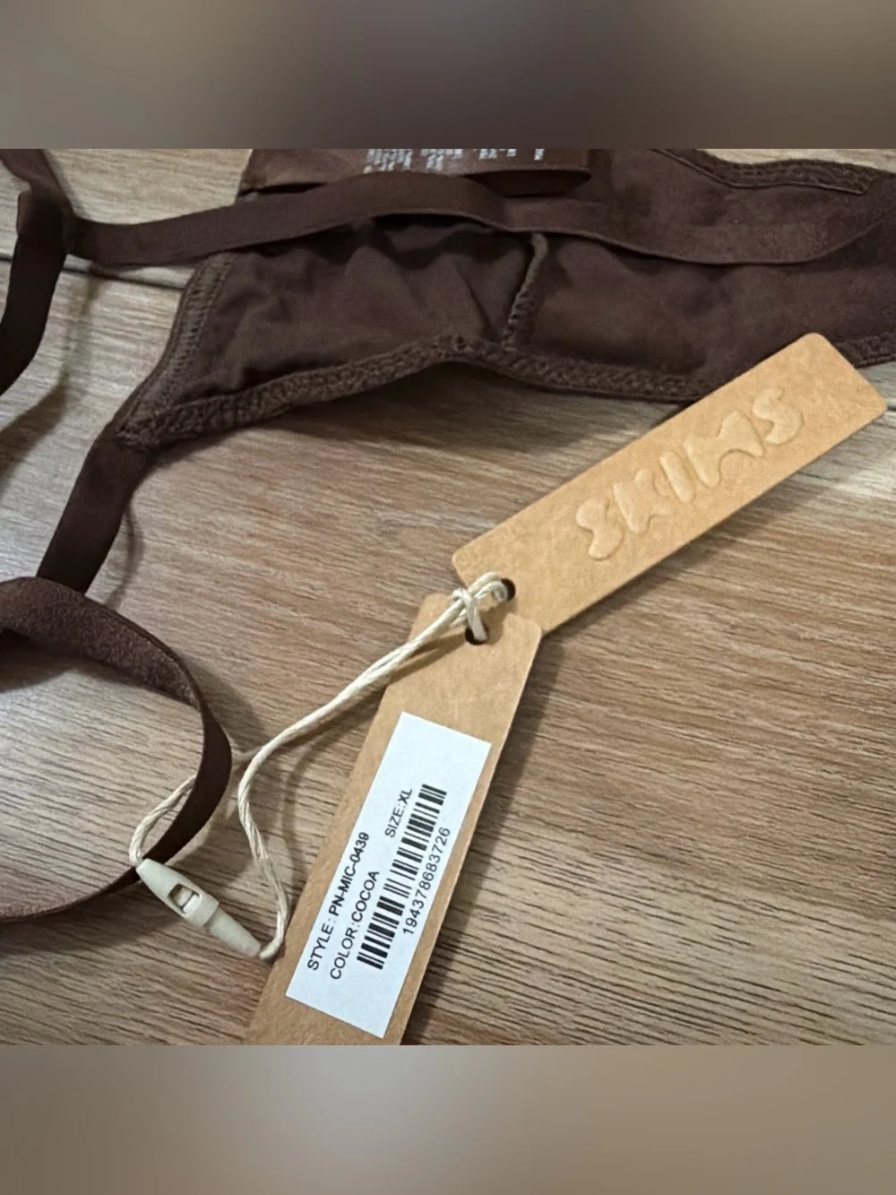 Skims Thong in color cocoa size XL